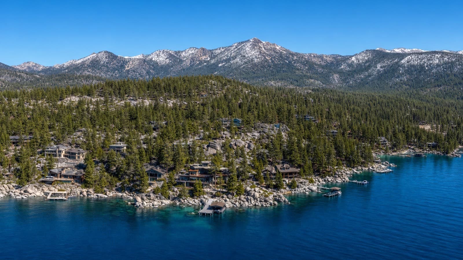 Luxury lakefront estate with floor-to-ceiling glass overlooking Lake Tahoe in Incline Village, Nevada
